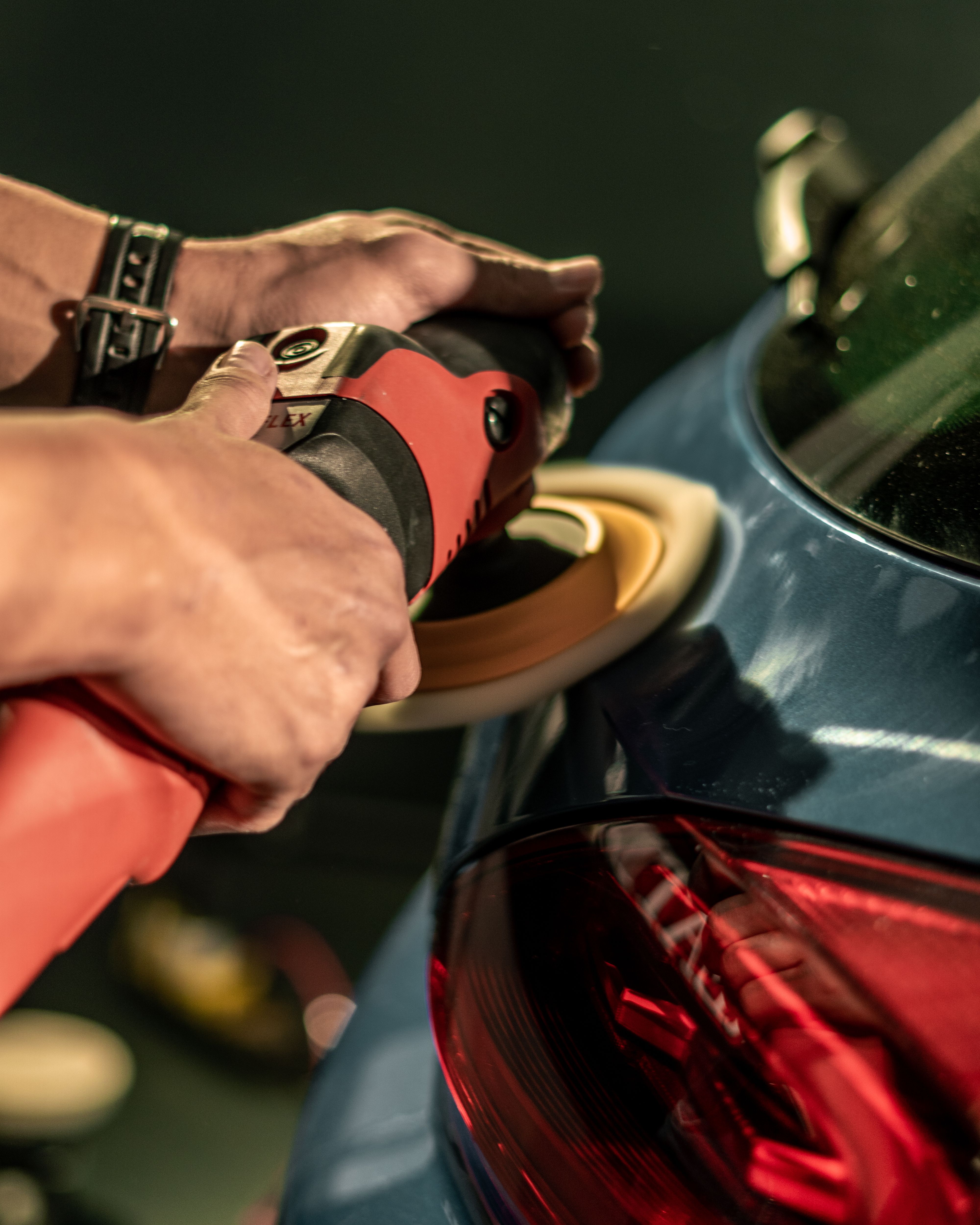 Close-up of dent removal work